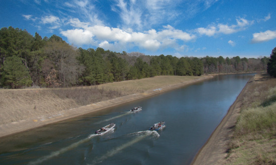Fishing boats on the canal connecting Lake Tyler with East Lake Tyler in East Texas